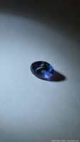 Front view of loose oval Tanzanite