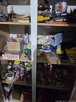 Full view of shelving with assorted tools, fasteners and supplies