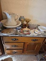 Overall view of washstand and contents