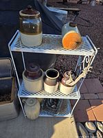 Full view of plant stand, crocks, jug and planter