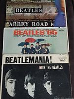 Front covers of all three Beatles albums