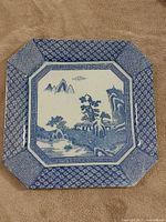 Full view of square blue transferware plate