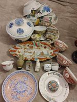 Group shot of all ceramic and cloisonne items