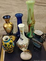 Group shot of all seven vases