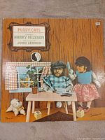 Front cover showing title, artist and artwork