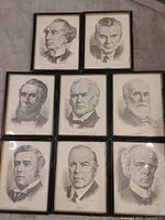 Group view of eight framed portrait prints