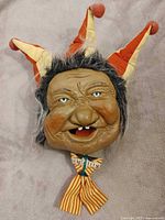 Front view of Peter Clown Laffin Head figurine showing full head, hat and bow tie