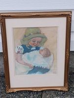 Full view of framed signed painting showing artwork, mat, and ornate frame