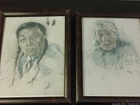 Both framed portraits side by side