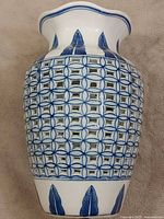 Full view of blue and white pierced lattice porcelain vase