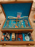Overall view of jewellery assortment inside box