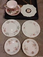 All seven Paragon china pieces laid out together