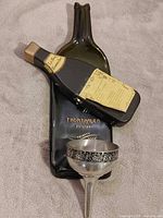 Full lot showing flattened Thornhaven Estates bottle stand, Le Bon Sommelier thermometer, and Royal Selangor funnel