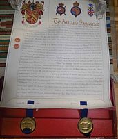 Full vellum document with seals and case visible