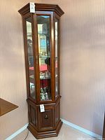 Full view of corner curio cabinet