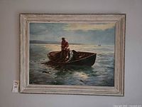 Front view of framed painting on wall