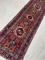 Full view of runner showing geometric pattern and border