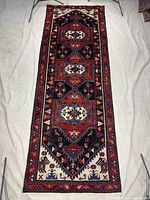 Full view of wool Saveh runner rug showing overall design and dimensions