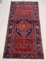 Full view of the Zanjan rug showing overall pattern and borders