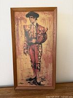 Front view of framed matador painting