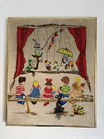 Full view of framed needlepoint artwork