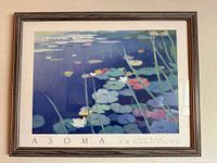 Full view of framed Lily Pond print on wall