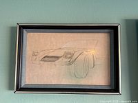 Full view of framed Lamborghini Cheetah concept drawing on wall
