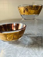 Two Culver bowls, one elevated to show sides