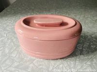 Top view of closed pink ceramic refrigerator dish
