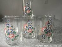 Front view of all six floral glasses grouped together