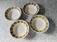 Overhead view of four Broadhurst Olympus bowls showing full pattern