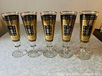 Front view of all five Libbey Stockholm pilsner glasses