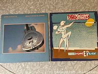 Both album covers side by side