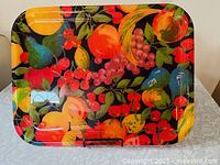 Front view of fiberglass tray showing full fruit pattern