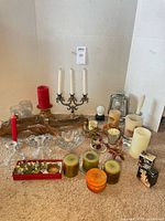 Overview of entire assortment of candles and holders