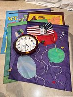 Assorted garden flags, Audubon bird clock, cloisonné hummingbird, U.S. flag and pole displayed
