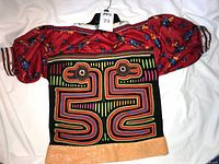 Front view of mola blouse showing overall design