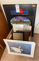 Group of frames, Ironman poster, box of assorted frames and prints