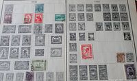 Two 1935 Scott album pages containing Peru stamps