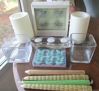 Group shot showing all candles, holders, boxed napkin rings