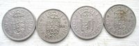 Four coins reverse side showing crowned English shield and dates