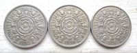 Group image of three two shillings coins dated 1955, 1956, 1958