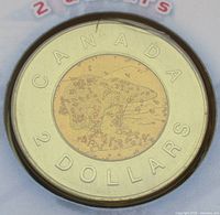 Reverse side showing polar bear and CANADA 2 DOLLARS legend