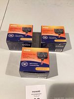 Three boxed Aube RC840T-120 relays