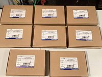 Eight unopened Emergi-Lite ES3WI cartons