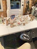 Overall view of table with all figurines displayed