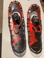 Full view of both Garneau Massif 930 snowshoes