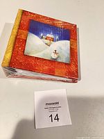 Front view of sealed DF Albums photo album showing winter scene cover