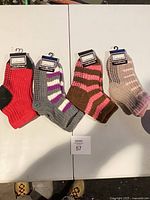 All four packaged pairs displayed on table