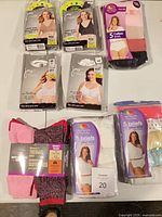 Group view of all packaged bras, briefs and socks